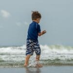 beach, playing, child, kid, outdoors, waves, seaside, seashore, coast, coastline, boy, sunbathing, beach, beach, beach, playing, child, child, seaside, seaside, boy, boy, nature, boy, boy, boy