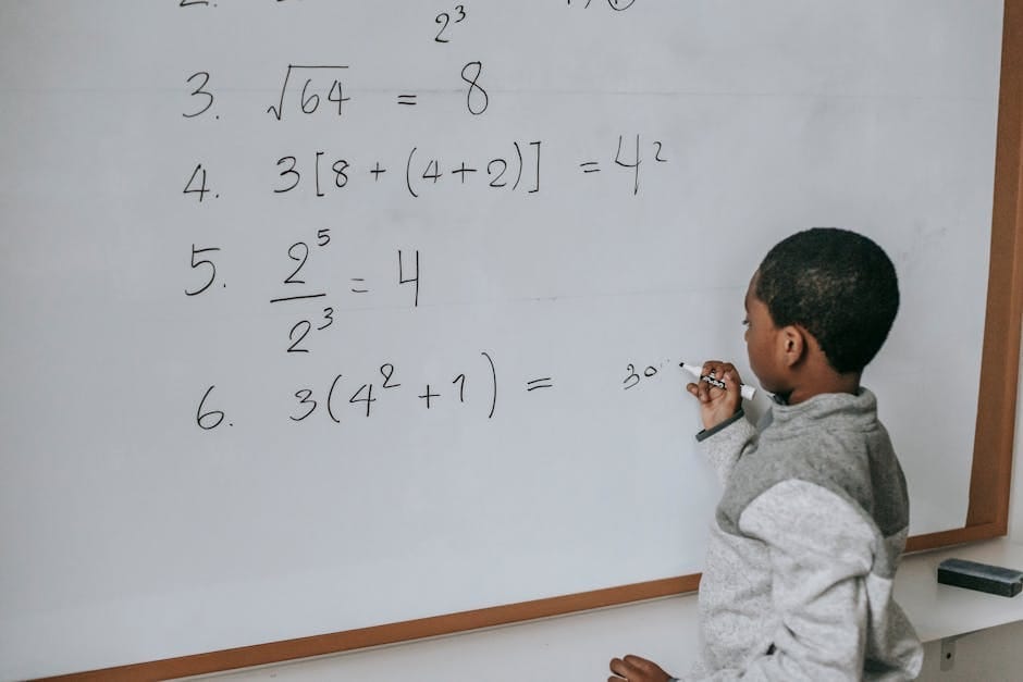 A focused child solves math problems on a classroom whiteboard, demonstrating learning and concentration.