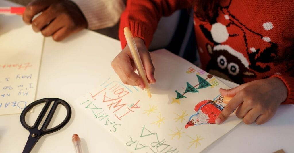 Children crafting heartfelt letters to Santa, full of creativity and holiday cheer.