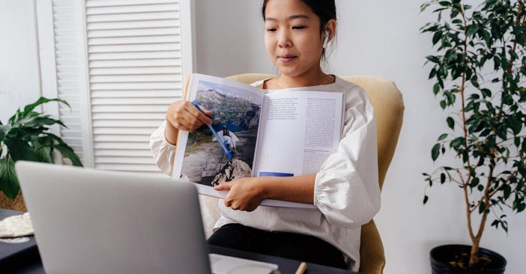 A young girl interacting with an online learning session at home, showcasing technology in education.