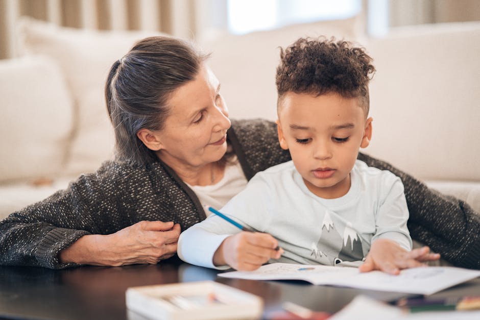 A grandmother lovingly assists her grandson in a cozy home setting.