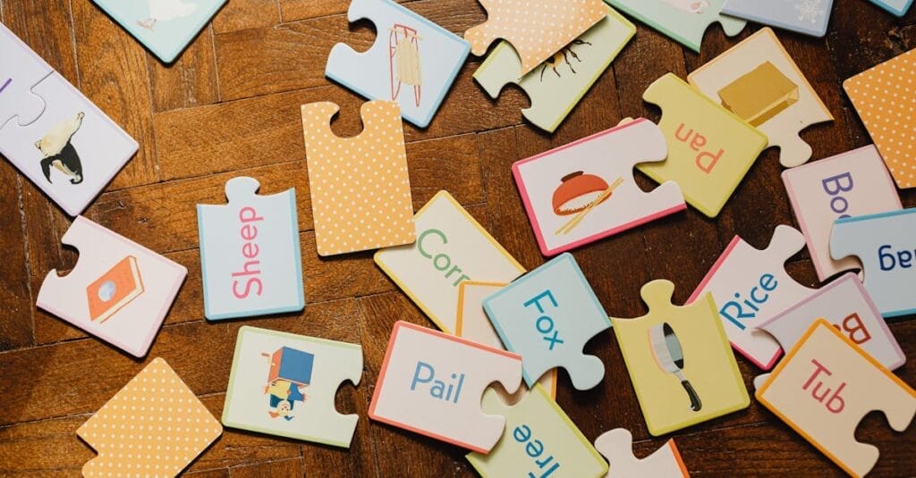 A scattered collection of educational puzzle pieces showcasing words and images on a wooden floor.