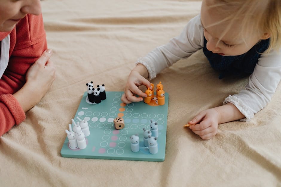 A child and adult enjoying a colorful animal-themed board game on a cozy setting.