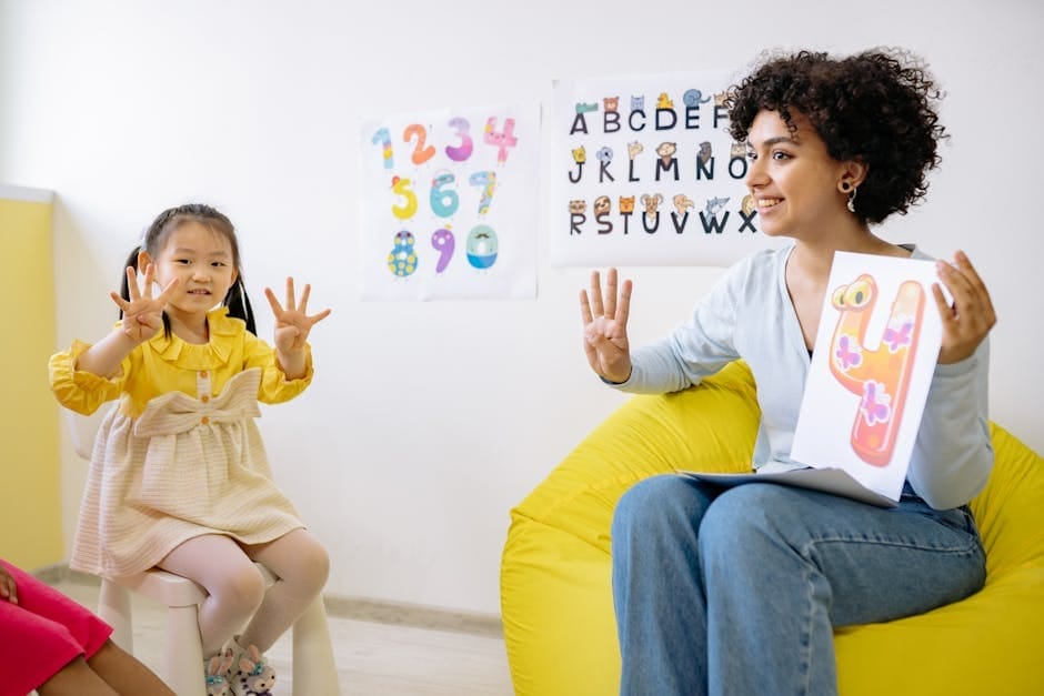 Teacher and child engage in counting and learning activities in a preschool classroom.