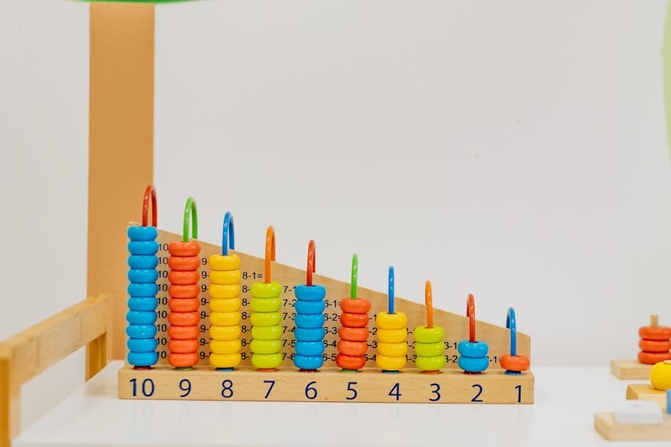 Close-up of a colorful wooden counting toy with numbers and shapes, perfect for preschool learning.