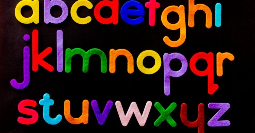 Vibrant alphabet letters arranged against a dark background for educational use.