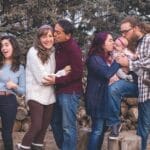 A cheerful family enjoying quality time together outdoors, capturing joyful and loving moments.